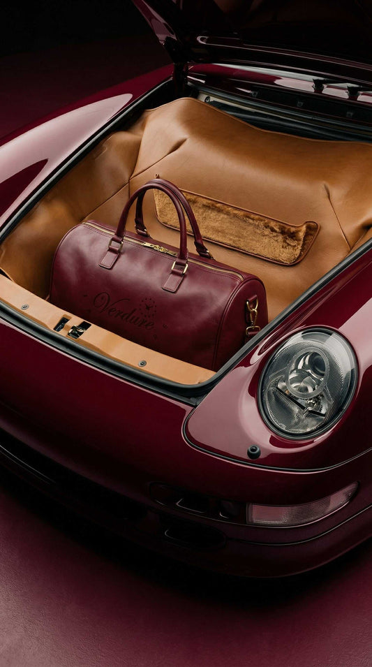 Journeyman Duffle bag with genuine cowhide leather, reinforced stitching, and multiple interior pockets for organized travel gear